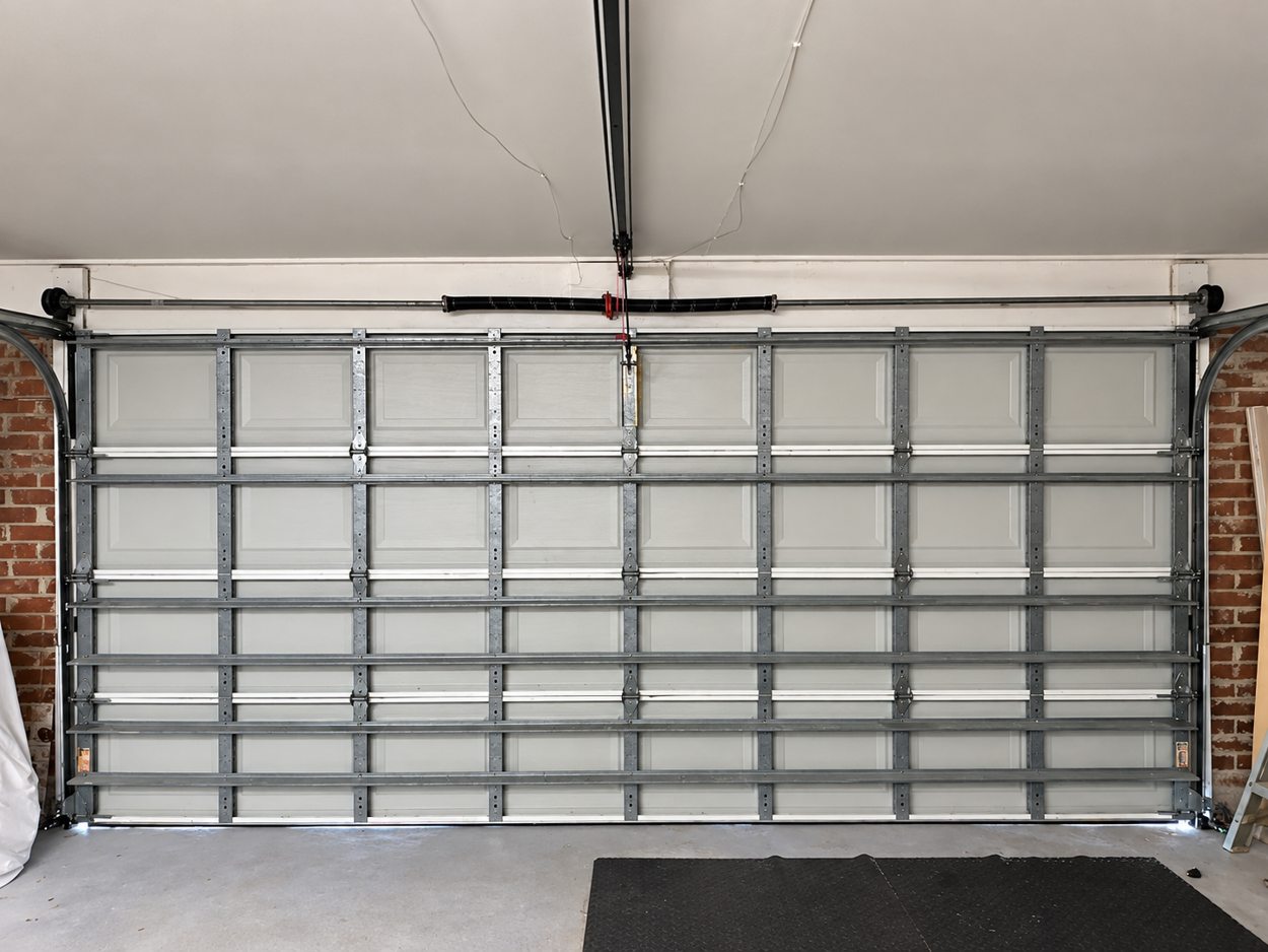 Illustrative garage door hardware from the interior